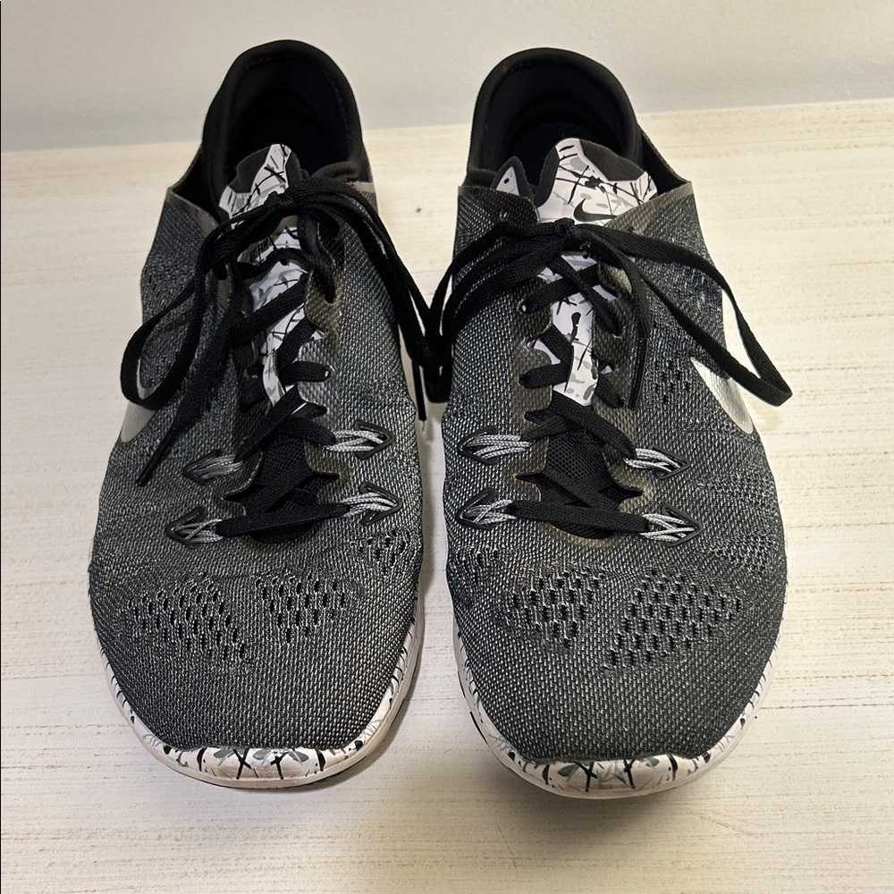 Nike Women's Black and White Flyknit Running Shoes